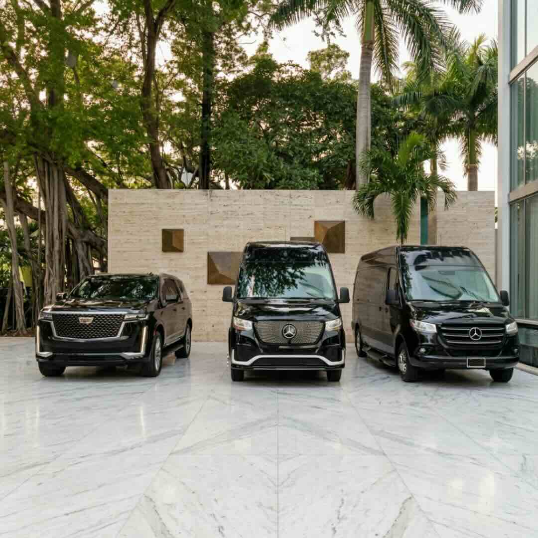 Merie's Orlando Express fleet — Cadillac Escalade SUV and two Mercedes-Benz Sprinter vans for MCO airport transportation